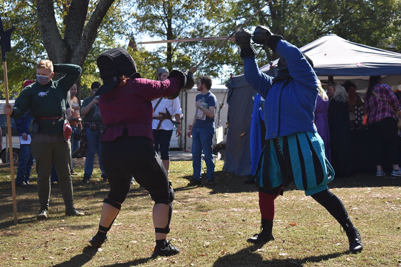 Female longsword fighters at faire